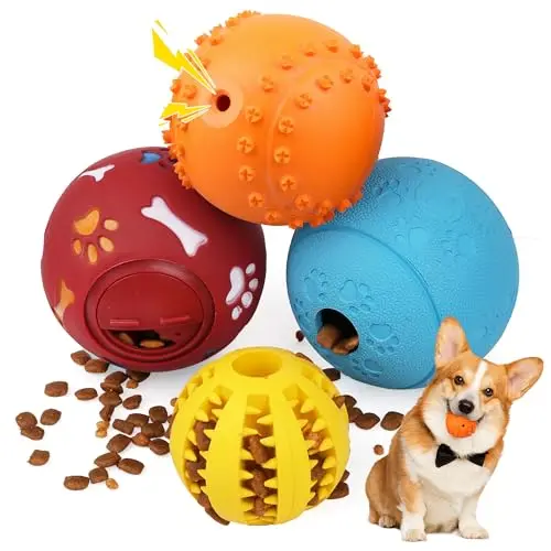Four colourful rubber treat balls for dogs