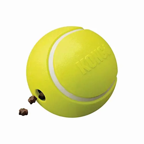 KONG Rewards Tennis Treat Dispenser, yellow with blue details, treats spilling