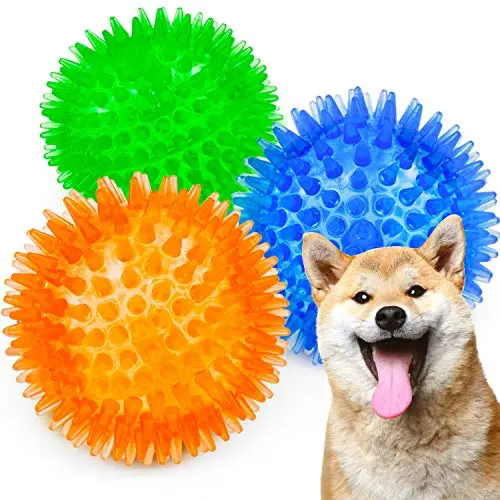 Three colourful SHARLOVY spiky squeaky balls, small size
