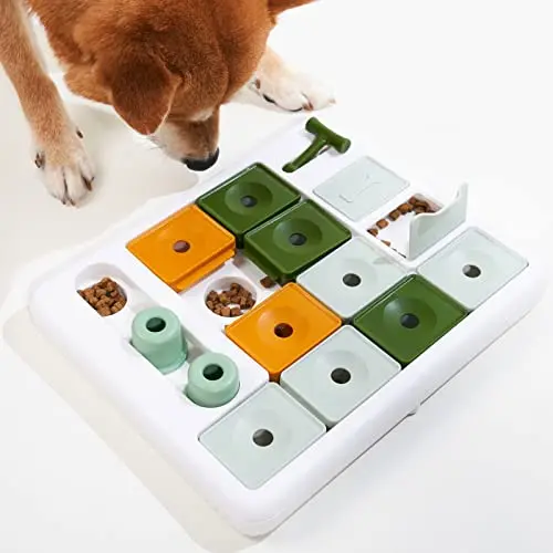 Barkwhiz green dog food puzzle with multiple compartments and sliders