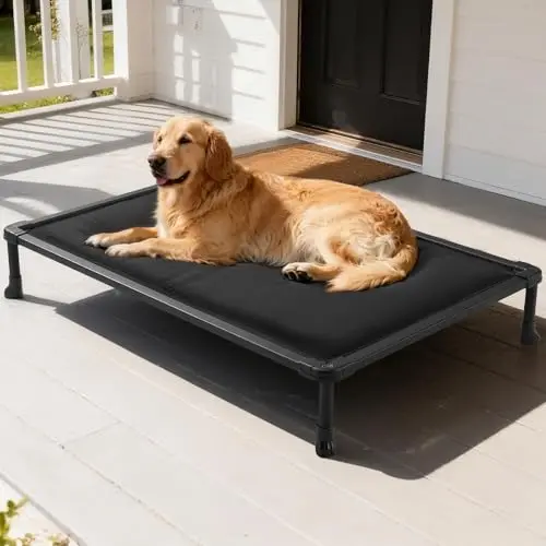 Veehoo Chew Proof Elevated Dog Bed with black waterproof mat and metal frame on indoor floor